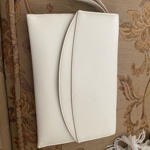 A new day cream clutch